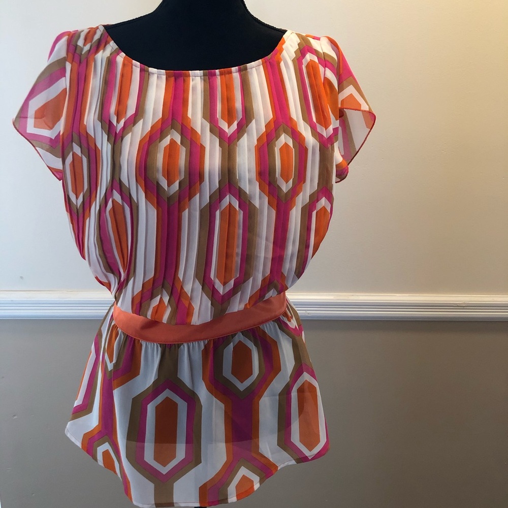 Blouse size M. Capacity Unlimited